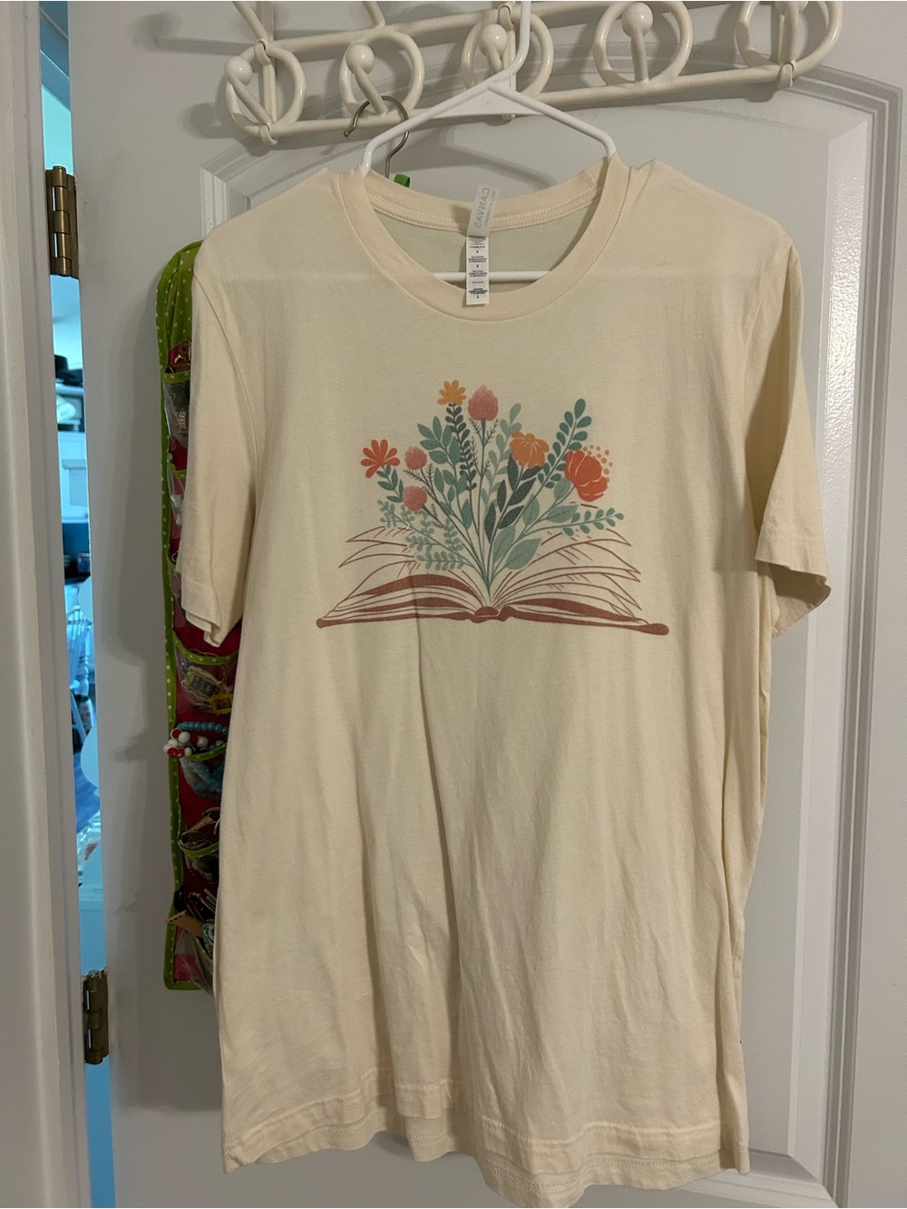 Cream Graphic Tee with Floral Book Design